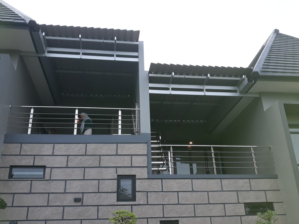 Atap buka tutup untuk area jemuran di rooftop